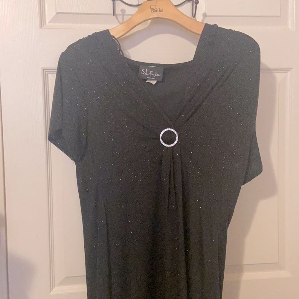 Like new dress. Only video does glitter justice
